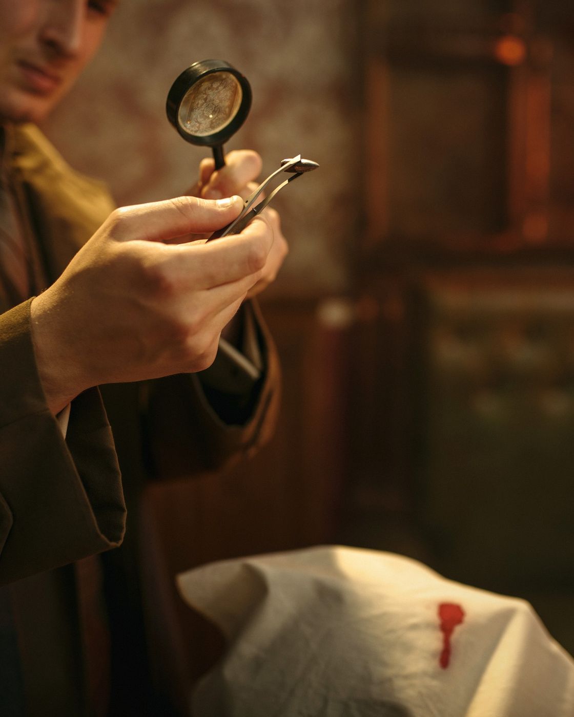 A detective examining evidence closely with a magnifying glass